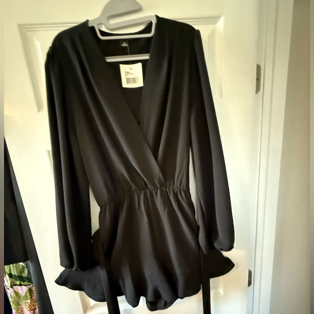 Flared romper in black